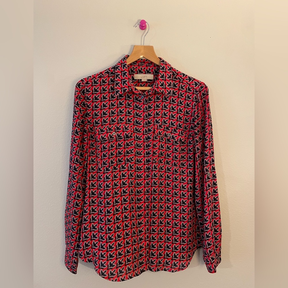 Red and navy print blouse.